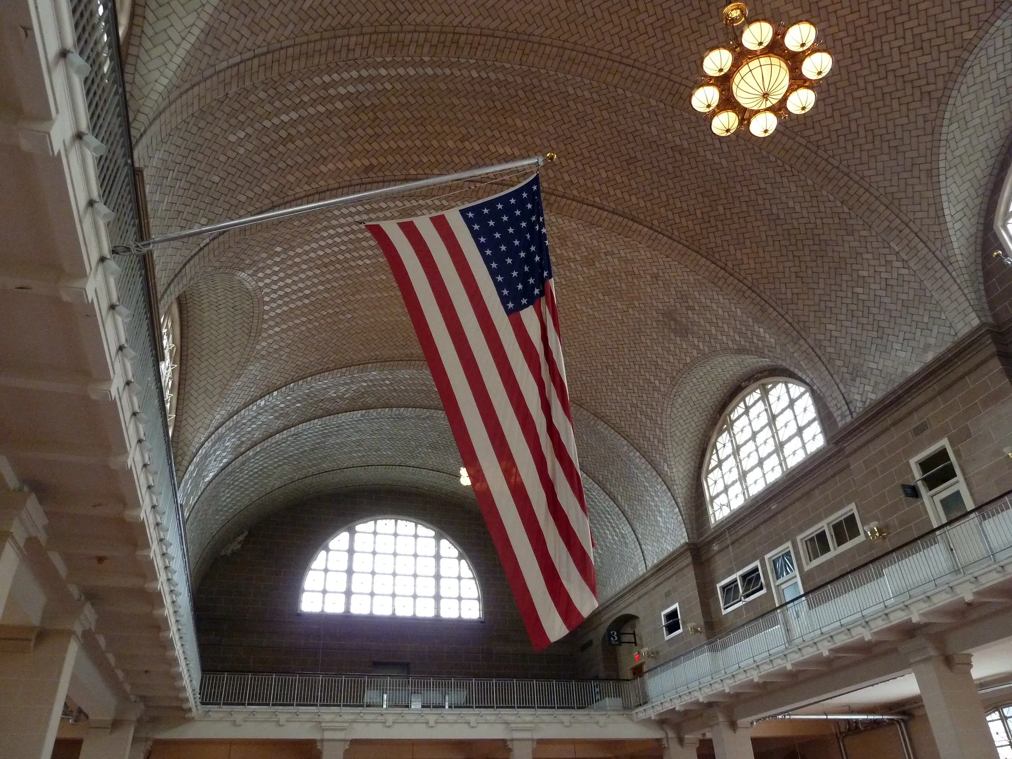 Real photo: The Great Hall registry room at Ellis Island.