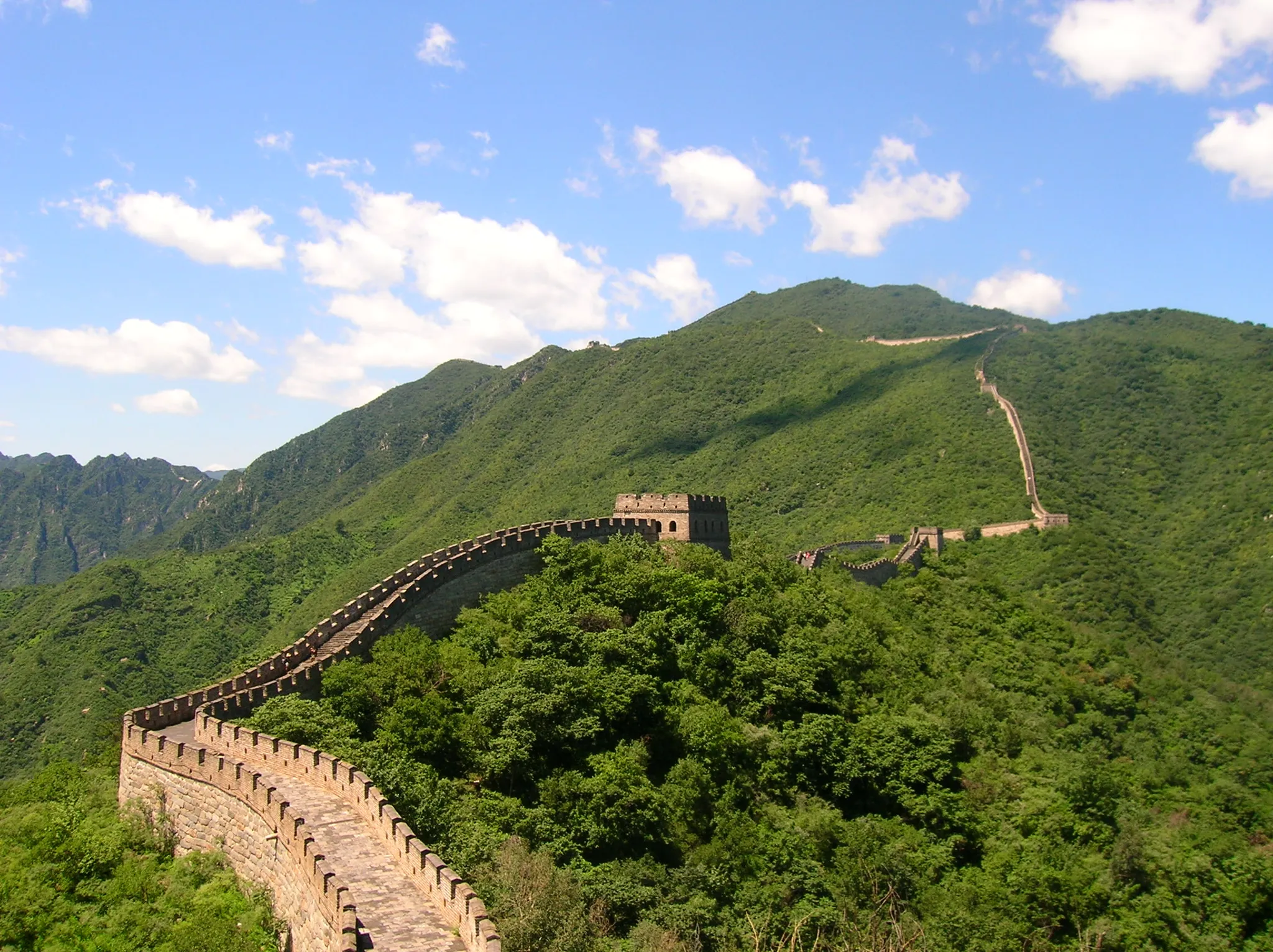 Real photo: The Great Wall at Mutianyu following the mountain ridge.