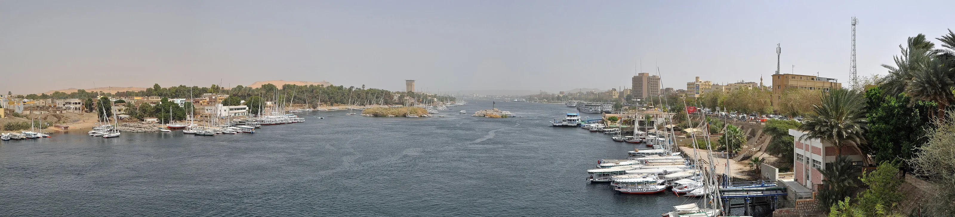 Real photo: The Nile at Aswan, where the river runs wide through granite and desert.